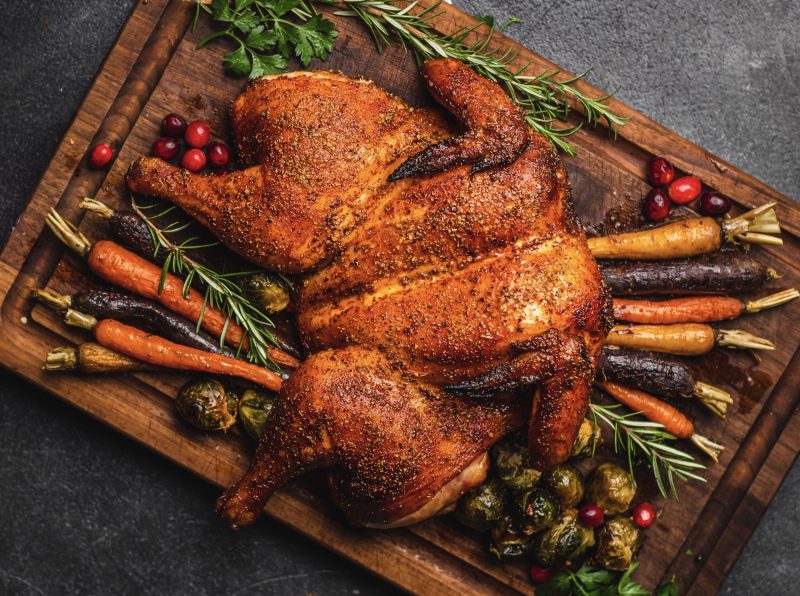Top View of Spatchcocked Chicken Surrounded by Veggies | Vitacost Blog