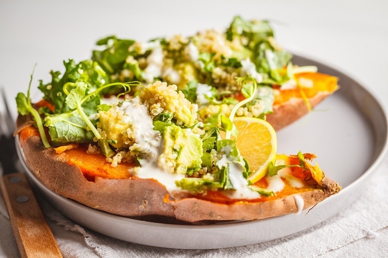 Vegan Stuffed Baked Sweet Potato Recipe Kale & Quinoa Loaded Sweet Potatoes with Miso Tahini Dressing | Vitacost.com/Blog