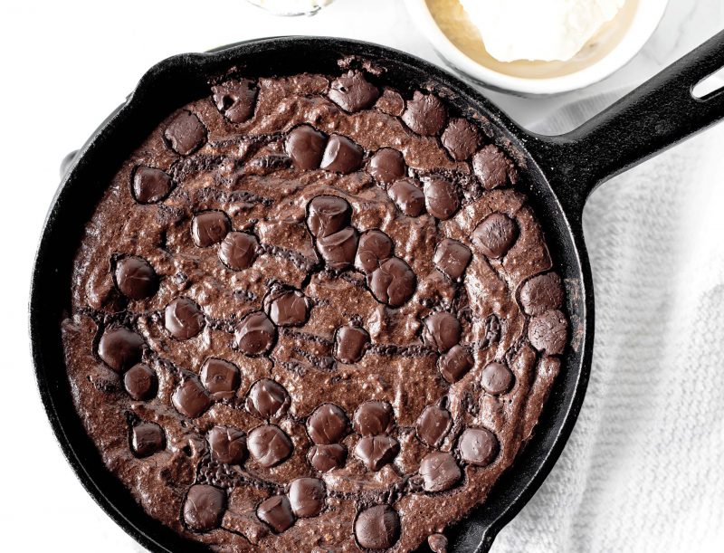 Top View Cast Iron Skillet Filled with Chocolate Chip Brownies | Vitacost Blog
