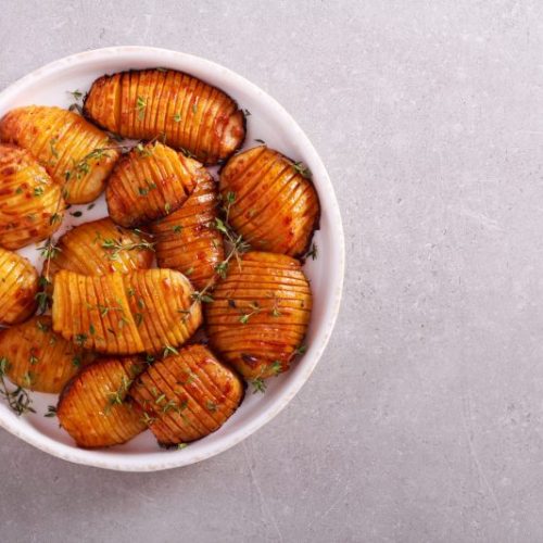 Top View Hasselback Potatoes in White Bowl | Vitacost Blog