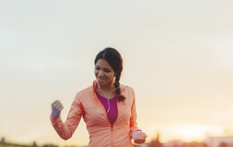 Excited Woman Satisfied with Achieving Fitness Health Goals During the Pandemic | Vitacost.com/blog