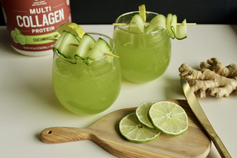 Two Glasses of Green Cucumber-Lime Mocktail in Front of Collagen Bottle | Vitacost Blog