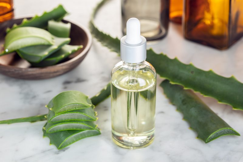 Clear Bottle Filled with Anti-Aging Eye Serum Next to Aloe | Vitacost Blog
