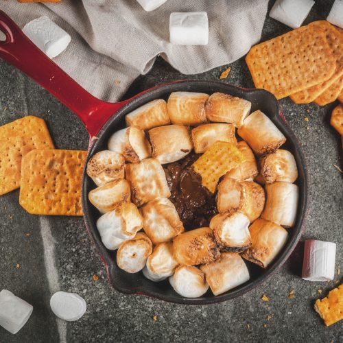 Top View S'mores Dip in Cast Iron Skillet Surrounded by Graham Crackers | Vitacost Blog