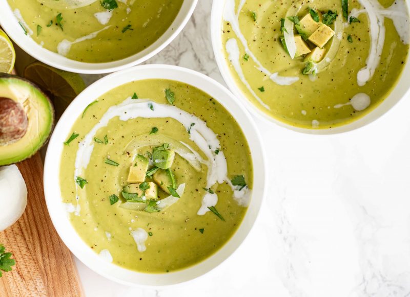 Top View Green Soup with White Swirl Garnished with Cilantro and Lime | Vitacost Blog