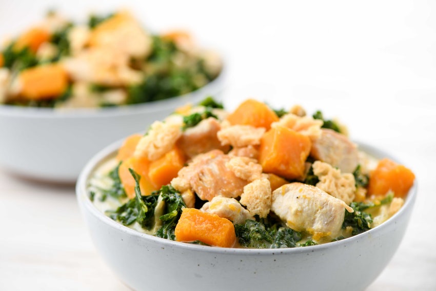 Autumn Chicken Stew with Kale and Butternut Squash in White Bowl