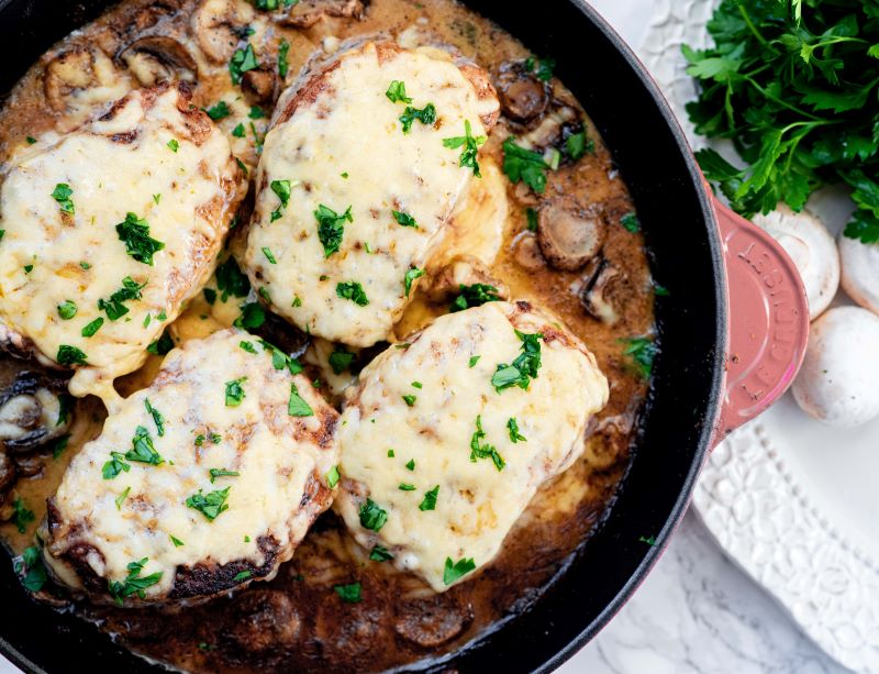 Four Cheesy Pork Chops with Mushroom Sauce in Skillet | VItacost.com/blog