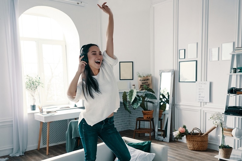 Dressed Up Woman at Home Dancing to Feel Beautiful During Quarantine | Vitacost.com/Blog