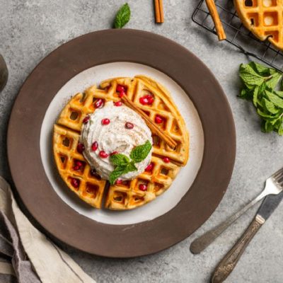 Waffles with Whipped Cream and Mint on Plate