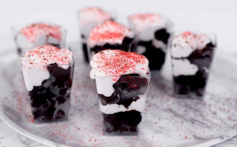 Tray of Single Serving-Sized Layered Chocolate Parfaits Garnished with Red Sprinkled | Vitacost Blog