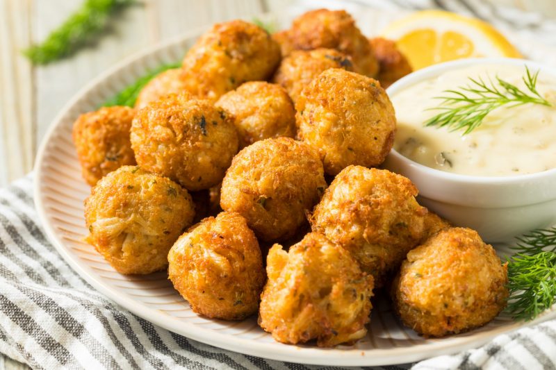 Bowl of Breaded Crab Bites Next to Bowl of Dipping Sauce | Vitacost Blog