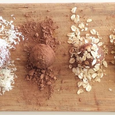 Homemade Vegan Chocolate Truffles on Cutting Board with Superfood Toppings | Vitacost.com/Blog