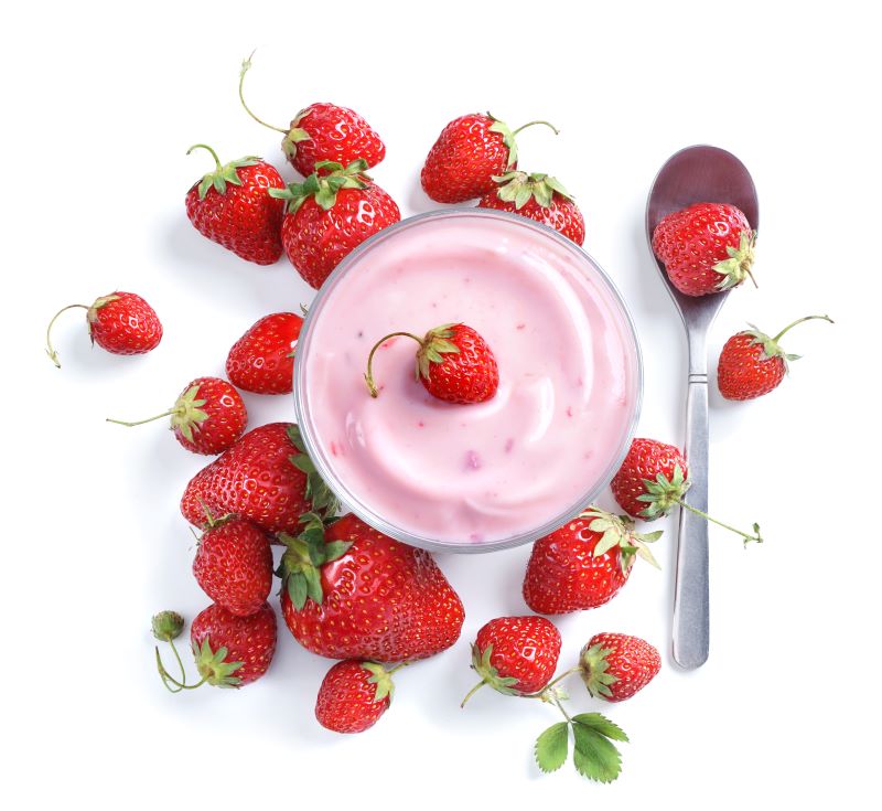 Strawberry Pudding in Bowl Surrounded by Strawberries on White Surface | Vitacost.com/blog