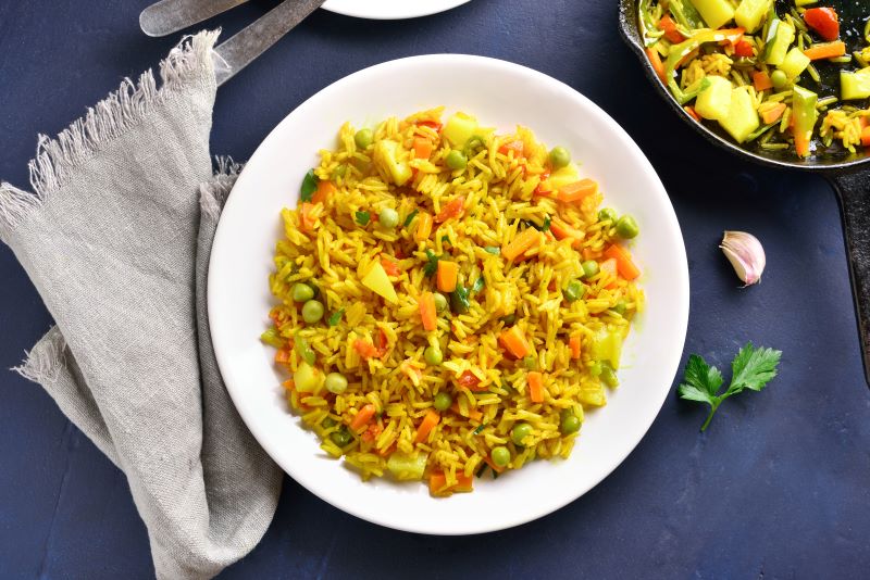 Turmeric Rice Pilaf with Coconut Milk in White Dish | Vitacost.com/blog