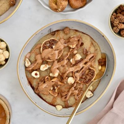 Amaranth Porridge with Figs, Almond Butter and Hazelnuts in Stoneware Bowl | Vitacost.com/bloge