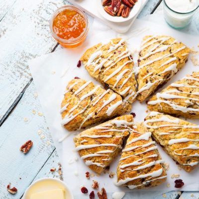Cranberry Scone Recipe (Gluten-Free) With Pecans and Glaze Drizzle on Serving Dish | Vitacost.com/blog