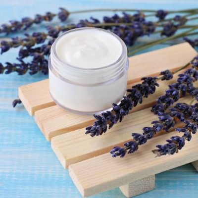 Homemade Lotion Made with Essential Oils in Jar on Wooden Soap Dish | Vitacost.com/Blog