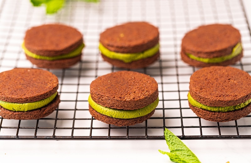 Homemade Chocolate Sandwich Cookies with Matcha Cream Filling on Wire Cooling Rack | Vitacost.com/Blog
