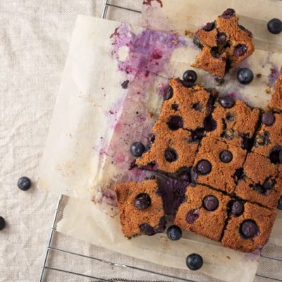 Gluten Free Blondies with Blueberries on Parchment Paper | Vitacost.com/blog