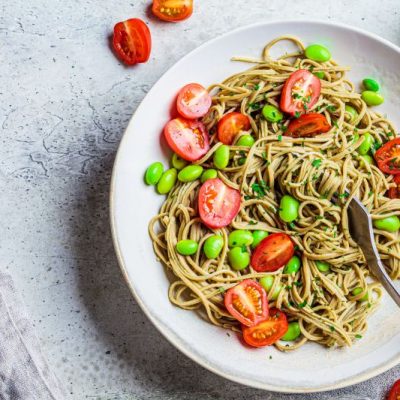 Edamame Spaghetti with Tomato & Basil on White Stoneware Plate | Vitacost.com/Blog