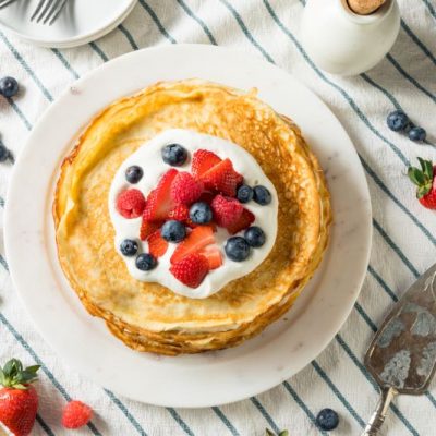 Chia Flour Keto Crepes with Whipped Cream & Berries on White Plate | Vitacost.com/Blog