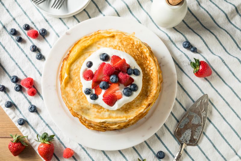 Chia Flour Keto Crepes with Whipped Cream & Berries on White Plate | Vitacost.com/Blog