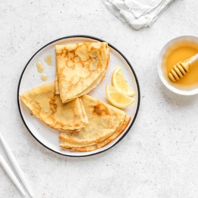 Gluten-Free Crepes with Honey and Lemon on White Plate | Vitacost.com/blog