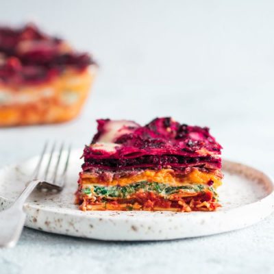 Slice of Rainbow Vegan Lasagna on White Stoneware Plate | Vitacost.com/blog