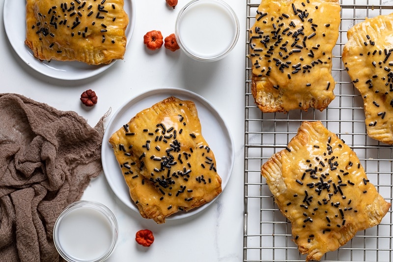 Homemade Pumpkin Pie Toaster Pastries with Chocolate Sprinkles on Cooling Rack | Vitacost.com/Blog