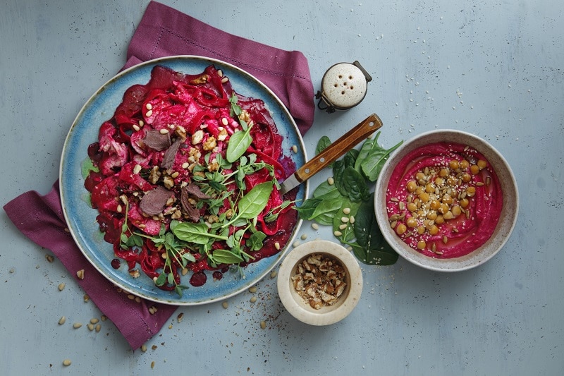 Lunch Spread Featuring Beet Salad, Beet Hummus, Greens and Nuts | Vitacost.com/Blog