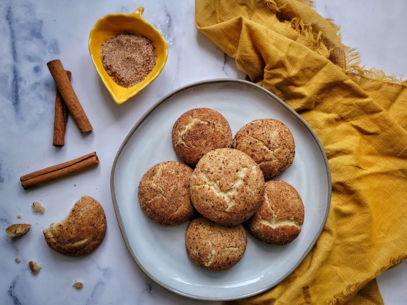 Pumpkin Spice Snickerdoodle Cookies on Stoneware Plate Near Saffron Linen Towel | Vitacost.com/blog