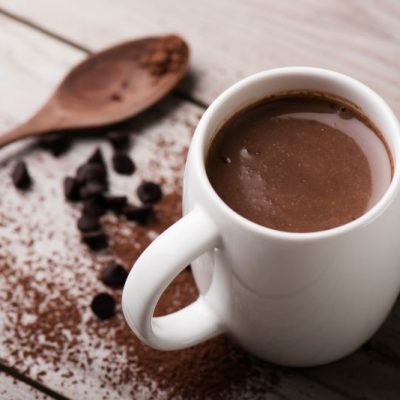 Creamy Keto Hot Chocolate in Mug on Wooden Tabletop | Vitacost.com/blog