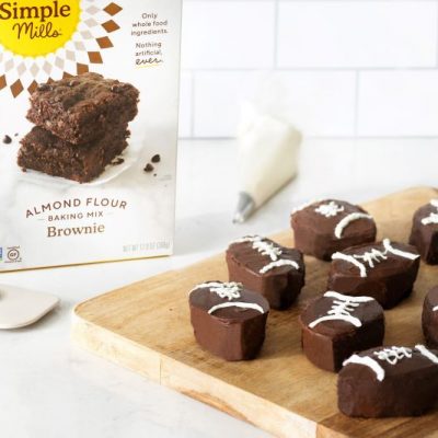 Football-Shaped Frosted Brownies on Wooden Serving Board | Vitacost.com/blog