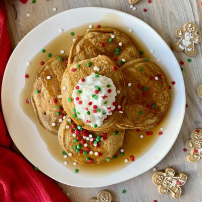 Gluten-Free Gingerbread Pancakes With Whipped Cream & Sprinkles on White Plate | Vitacost.com/blog