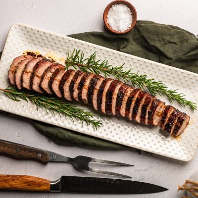 A White Rectangular Serving Platter With Sliced Pork Loin Roast | Vitacost Blog