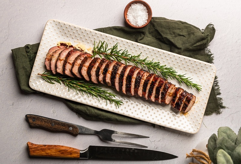 A White Rectangular Serving Platter With Sliced Pork Loin Roast | Vitacost Blog