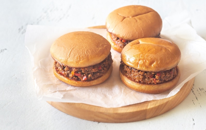 Three Homemade Vegan Lentil Sloppy Joes on Cutting Board | Vitacost.com/Blog