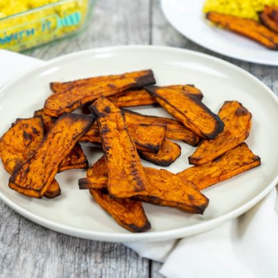 Homemade Plant-Based Sweet Potato Bacon on Plate on Table with Tofu Scramble | Vitacost.com/Blog