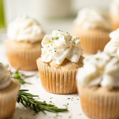 Sideview Shot of Vegan Celery Cupcakes with Lemon Frosting on White Counter | Vitacost.com/blog