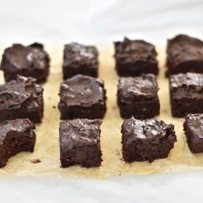 Homemade Chocolate-Frosted Chocolate Beet Brownies on Parchment Paper | Vitacost.com/Blog