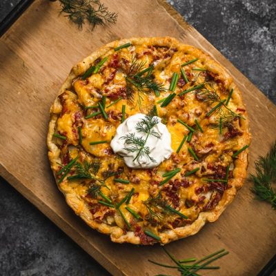 Homemade Cheesy Bacon Potato Pie with Heavy Cream Garnished with Fresh Dill and Chives | Vitacost.com/Blog