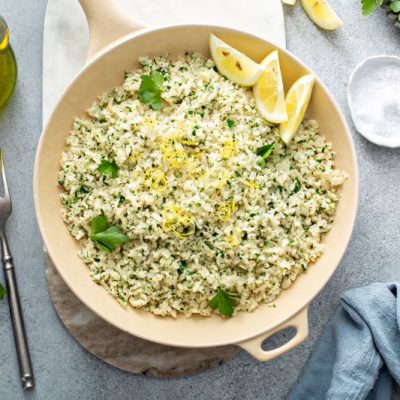 Lemon Riced Cauliflower with Herbs & Spinach in Skillet on Countertop | Vitacost.com/blog
