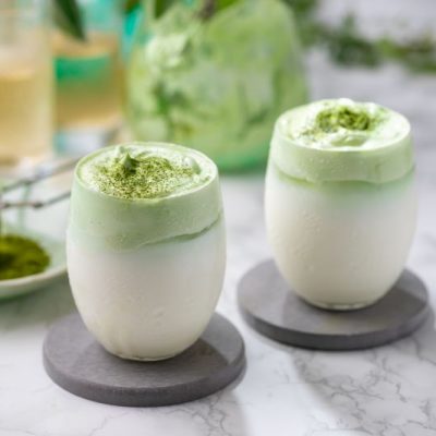 Macadamia Milk Matcha Latte Recipe in Two Glasses on Marble Table | Vitacost.com/blog