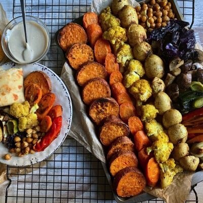 A Sheet Pan is Filled With Roasted Root Vegetables to Represent a Roasted Vegetables Recipe | Vitacost.com/Blog