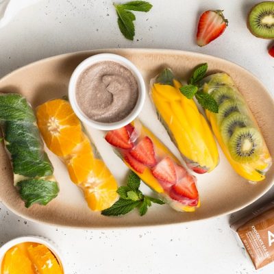 A Platter of Bright-Colored Fruit Spring Rolls With Aloha Protein Chocolate Dipping Sauce | Vitacost.com/Blog
