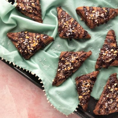 Vegan banana scones with chocolate drizzle and hazelnuts and green tea towel | Vitacost.com/blog