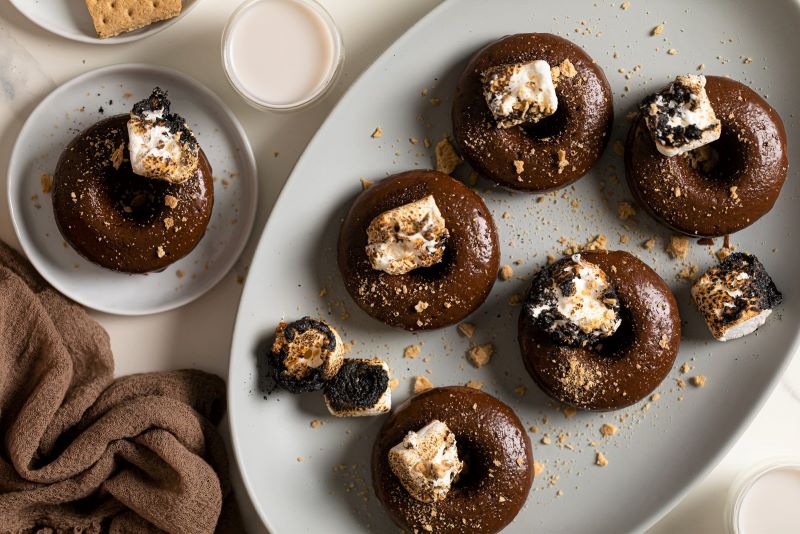 Baked S’mores Donuts with Crushed Graham Crackers & Toasted Marshmallow on Serving Platter | Vitacost.com/blog