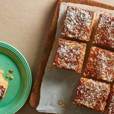Squares of Indian Honey Cake are Sprinkled With Coconut Flakes to Represent a Honey Cake Recipe | Vitacost.com/Blog
