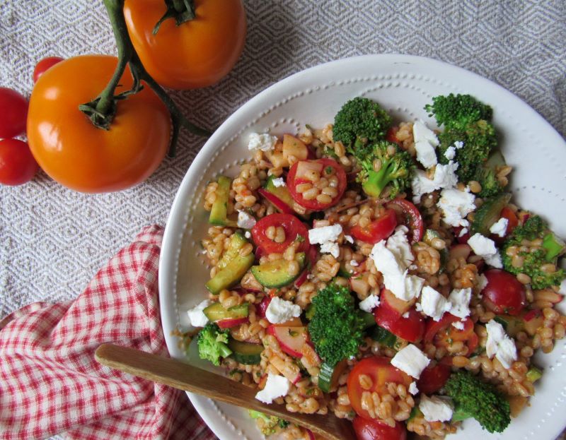 Barley Salad with Broccoli, Tomatoes and Feta Cheese in Serving Bowl on Picnic Blanket | Vitacost.com/Blog