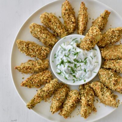 Seed-Coated Air Fried Artichoke Hearts on Round Plate with Lemon-Dill Yogurt Dip | Vitacost.com/Blog